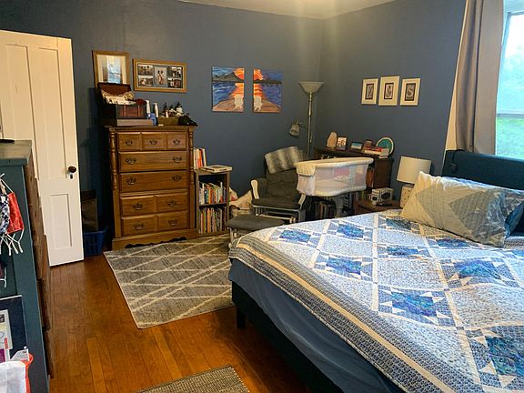 Bedroom 1, This is actually the bedroom from the other side. Bedroom in rental unit is mirror image and different paint