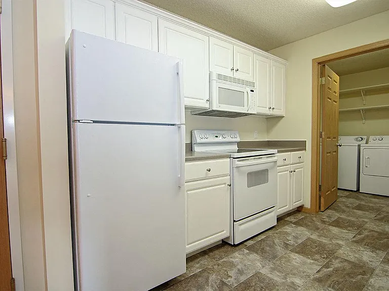 Our kitchens are equipped with modern appliances for everyday convenience.