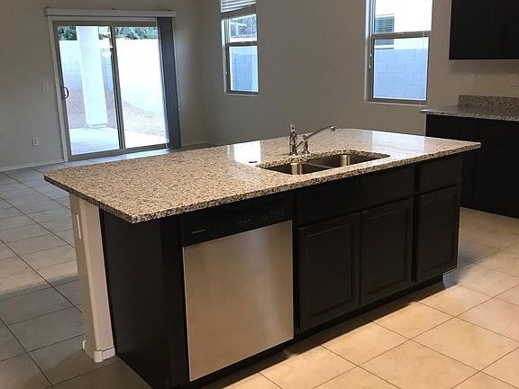 Open kitchen with granite countertops