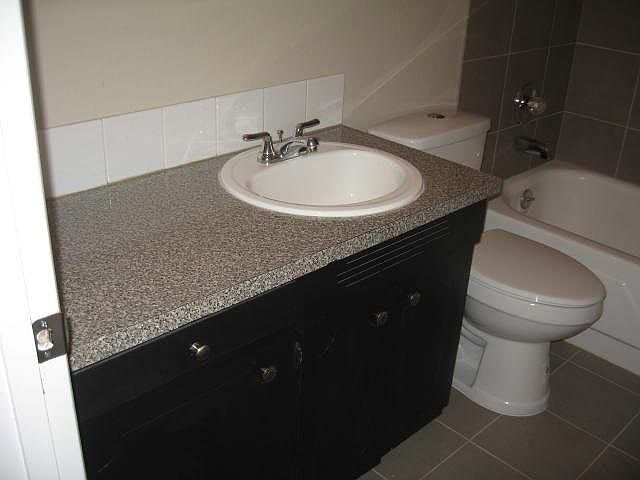 tile floor, new hi eff toilet