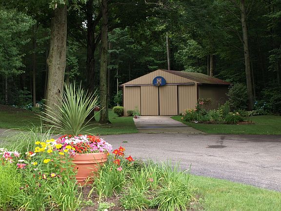 Paved driveway to pole barn & house.