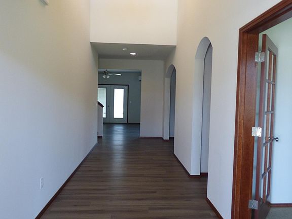 Very open vaulted entry way from front door. Office/ den to the right then halway full bath