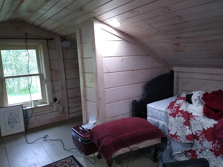 Sleeping loft with half bath cubby