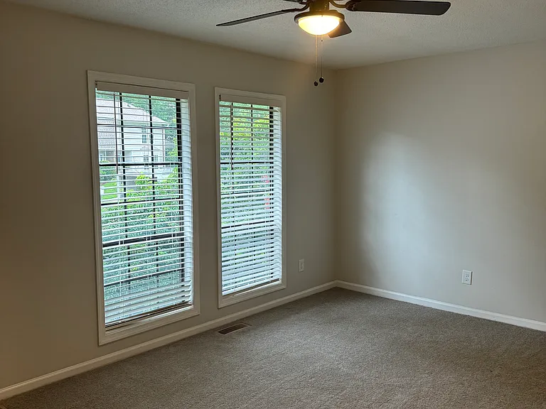 Master Bed with new blinds and fan