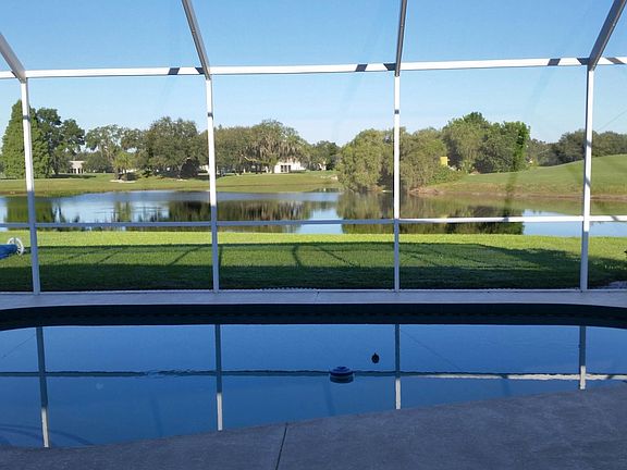 Enclosed solar heated pool with lake view to thee west.