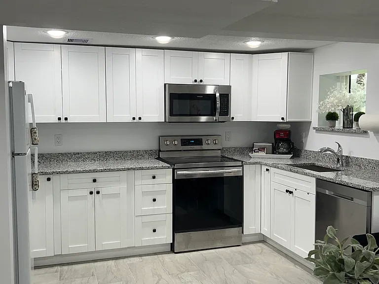 newly remodeled kitchen with stainless steel appliances