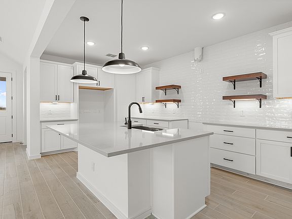 Kitchen with pendant lights