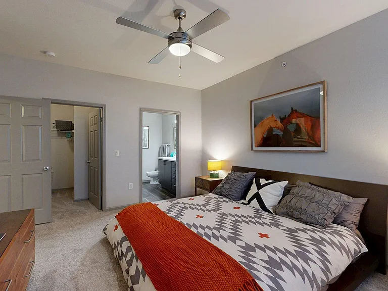 Spacious apartment Bedroom with Carpet Floor.