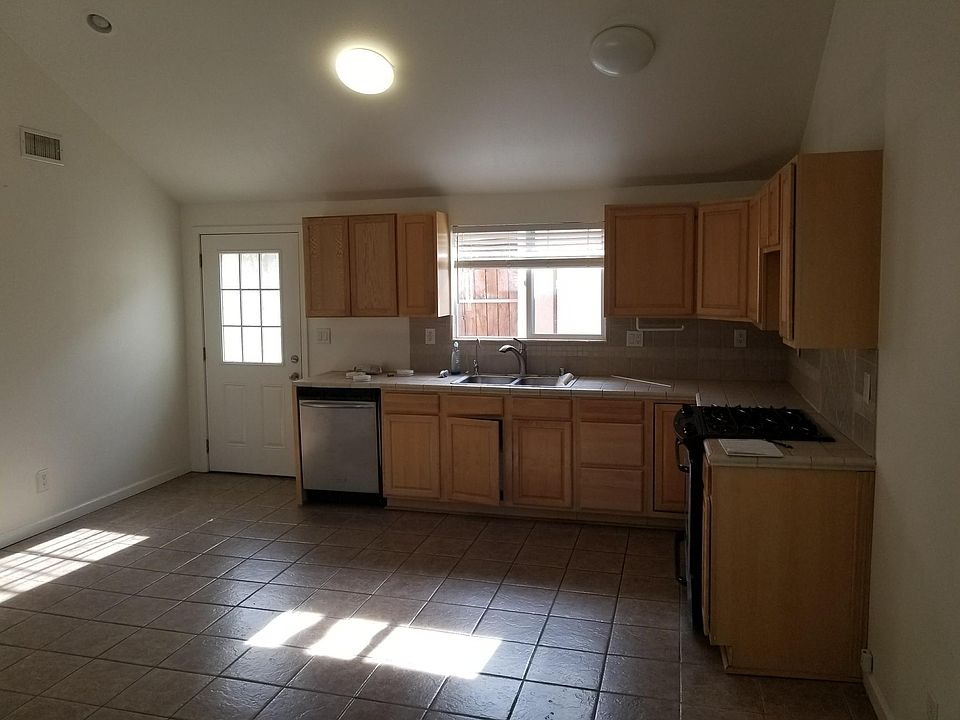 Kitchen and door to yard & laundry
