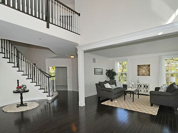 2 story foyer flanked by Formal Living and DR