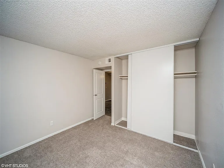View of closet space in bedroom