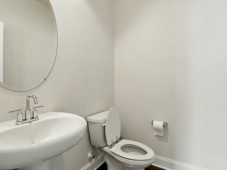 Half Bath - Main-floor half bath easily accessible for guests and everyday use.