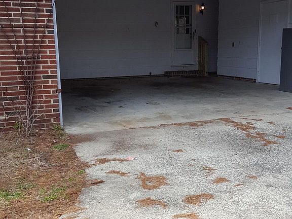 2 car garage, storage room to the side