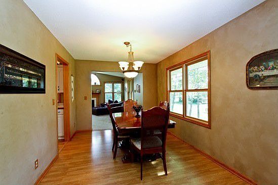 Updated lighting in this formal dining room with make holidays and family gath