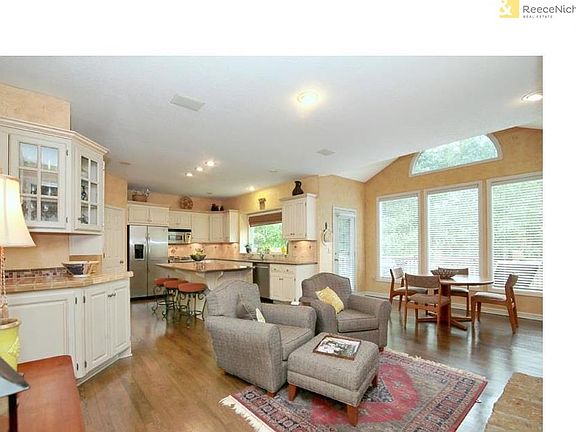 Large, updated kitchen with granite counters and island
