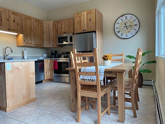 Newly renovated kitchen. Table seats 6 or 8 with leaf and entryway bench.