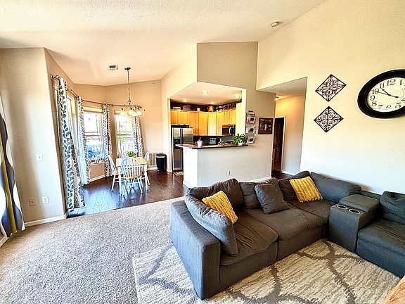 Family room looking towards kitchen. Lots of light