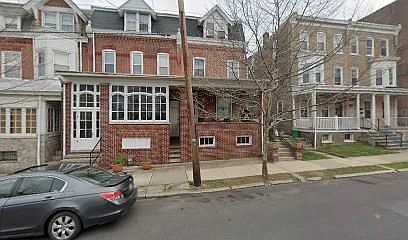 Open porch on tree lined street