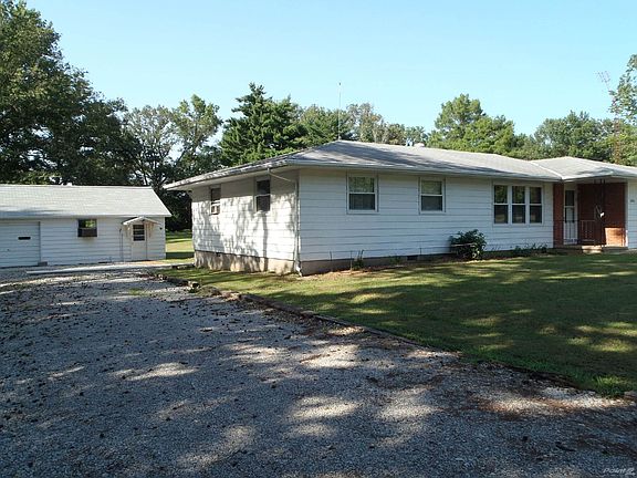 Side View with detached garage.