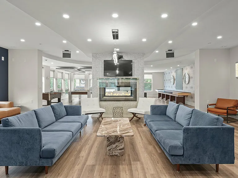 Experience the sophistication of this modern lounge, perfect for relaxation and entertainment.