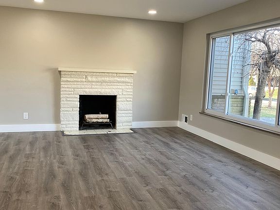 spacious living area with lots of natural light