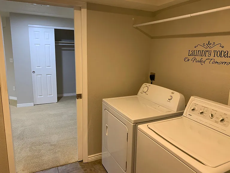 Washer and dryer in basement bathroom