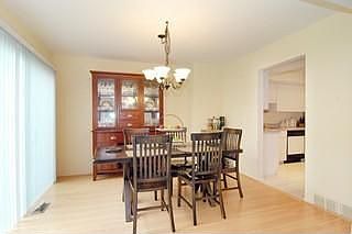 Large formal dining room with views of the golf course.