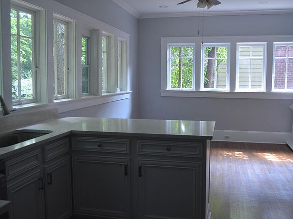 Breakfast bar to the living room and so many windows!