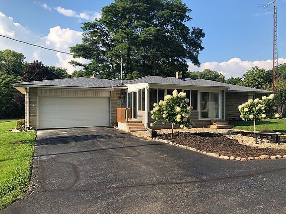 Back of house and sunroom