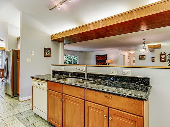 Kitchen open to main living area and breakfast nook