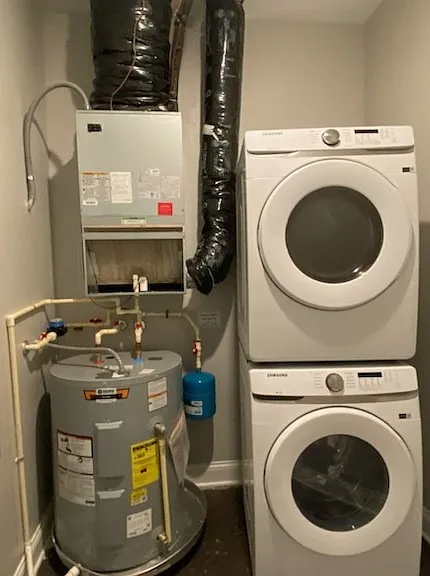 Utility Closet with stackable full sized Samsung Washer & Dryer included in every unit. Utility Closet with stackable full sized Samsung Washer & Dryer included in every unit.