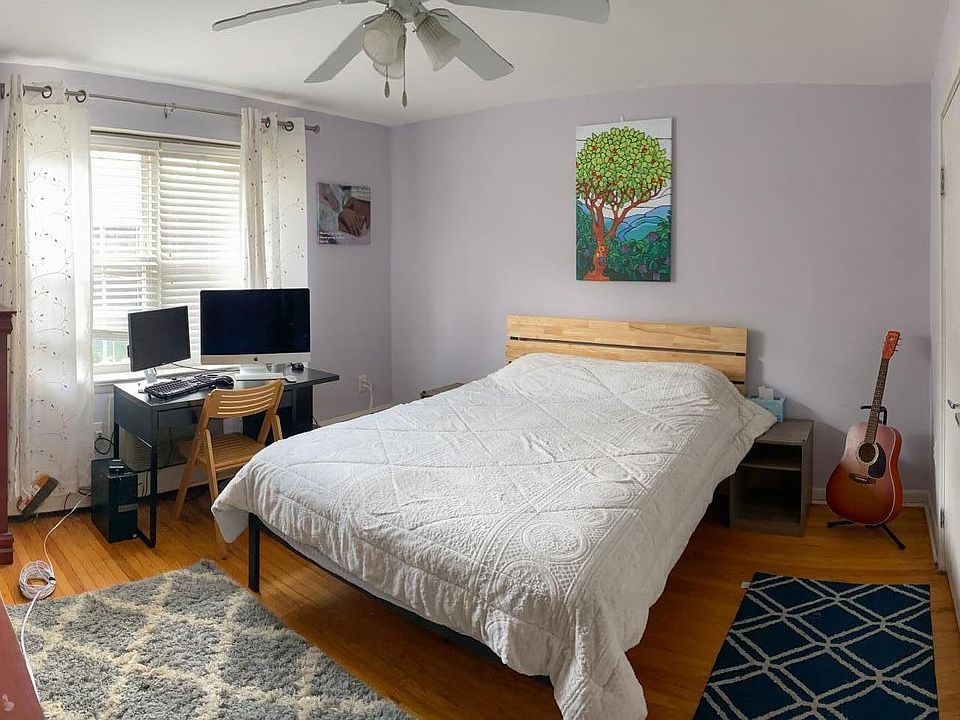 Master bedroom with custom fitted, deep closet