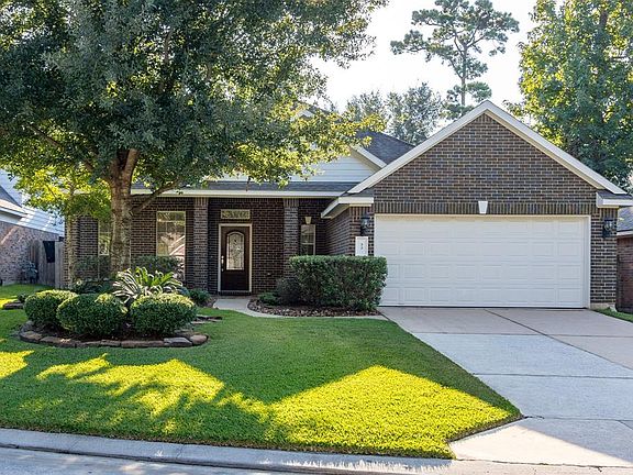 Double wide driveway for easy access and ample parking.