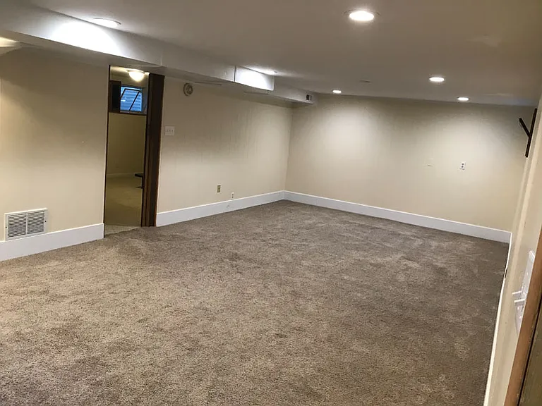 Very Large Living Room. Newly installed lighting and insulation in ceiling