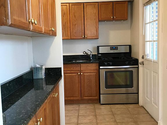 Access to kitchen from dining area.