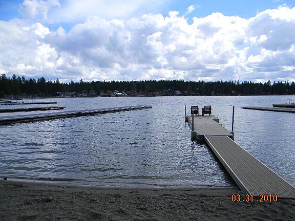 The nice sandy beach and dock.