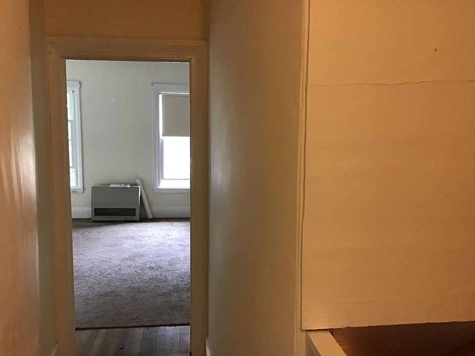 Hallway looking into the Living room .
The kitchen is to the left, bedroom to the right, Bath off of the kitchen..