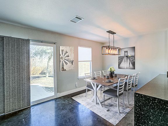 Sunny dining area - photo has been virtually staged