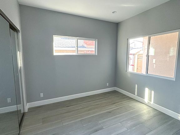 Mirrored closet doors + light inside closet