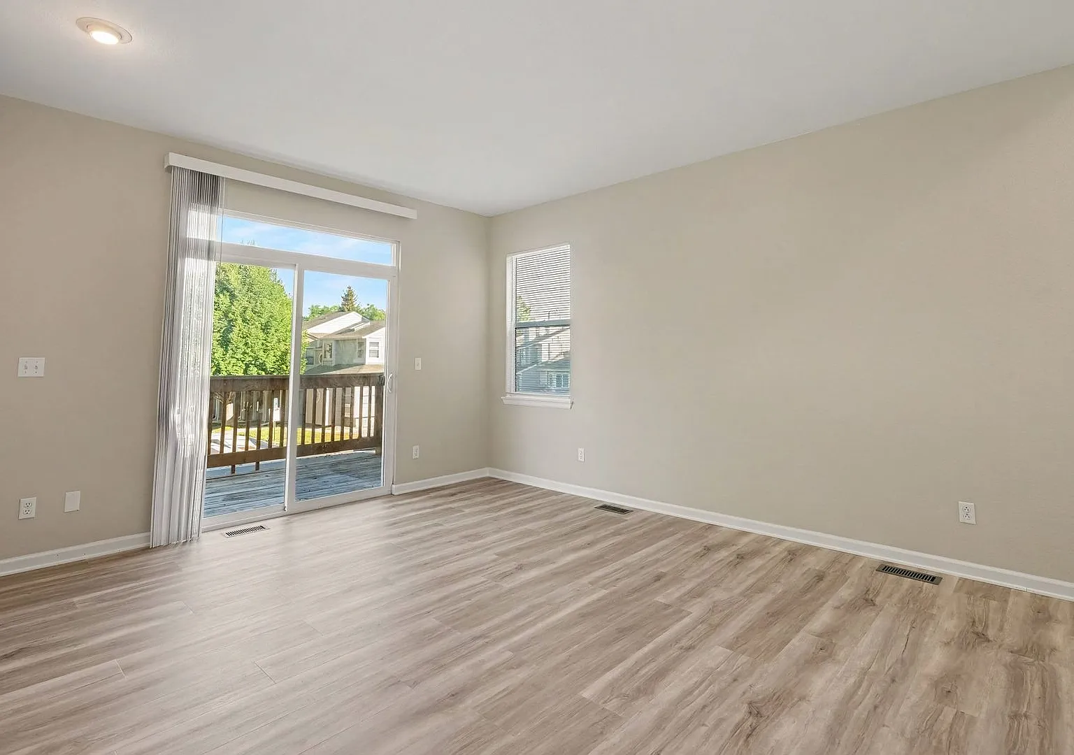 Beautifully Updated 3-Bedroom Townhome with Finished Basement, 2-Car Garage & Views — Photo 4