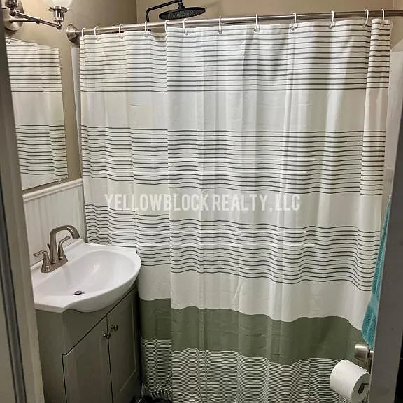 320 E 79th Ter — Photo 24