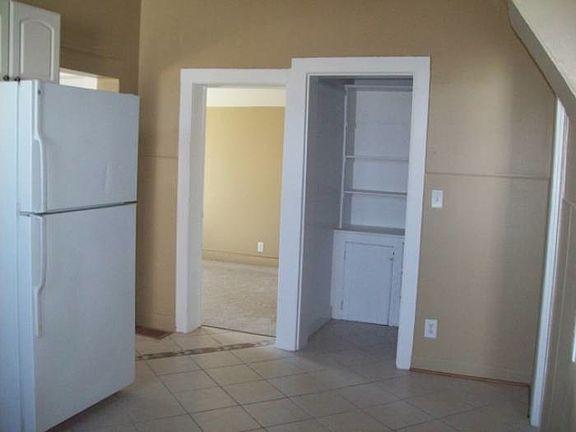 Opposite view of Kitchen into Pantry or Bedroom #1