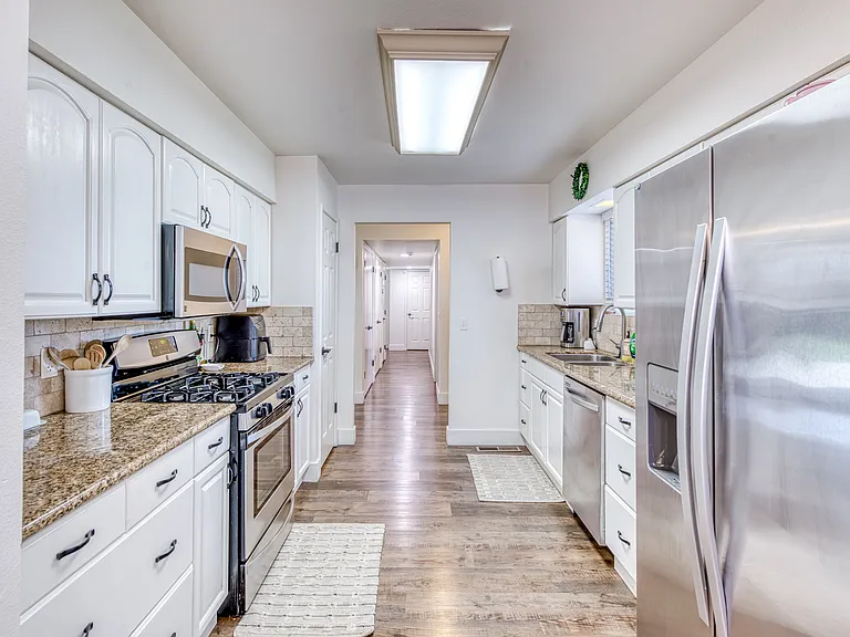 Galley kitchen off the front door