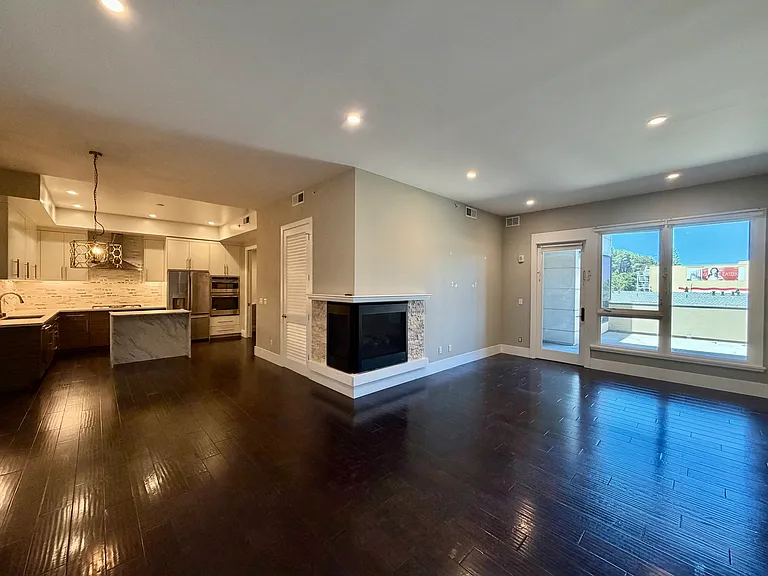 Entry into Open Living, Dining & Kitchen Spaces