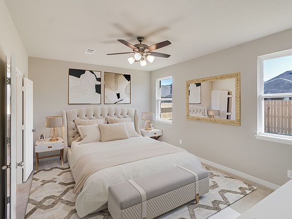 Primary bedroom. Note Sample product photo - actual exterior and interior selections may vary by ho