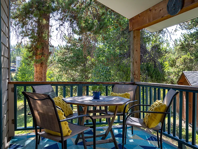This is a side deck and one of two. It has a nice access to some open/green space.