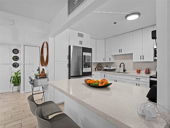2nd image of 671 NE 195th St APT 329E