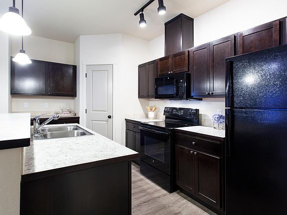 Top floor upgraded kitchen with large pantry and side bar