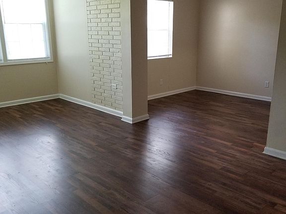 First-floor den, sunroom, and dining room