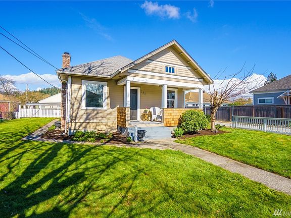 Large covered front porch, perfect for relaxing in a comfy rocking chair.